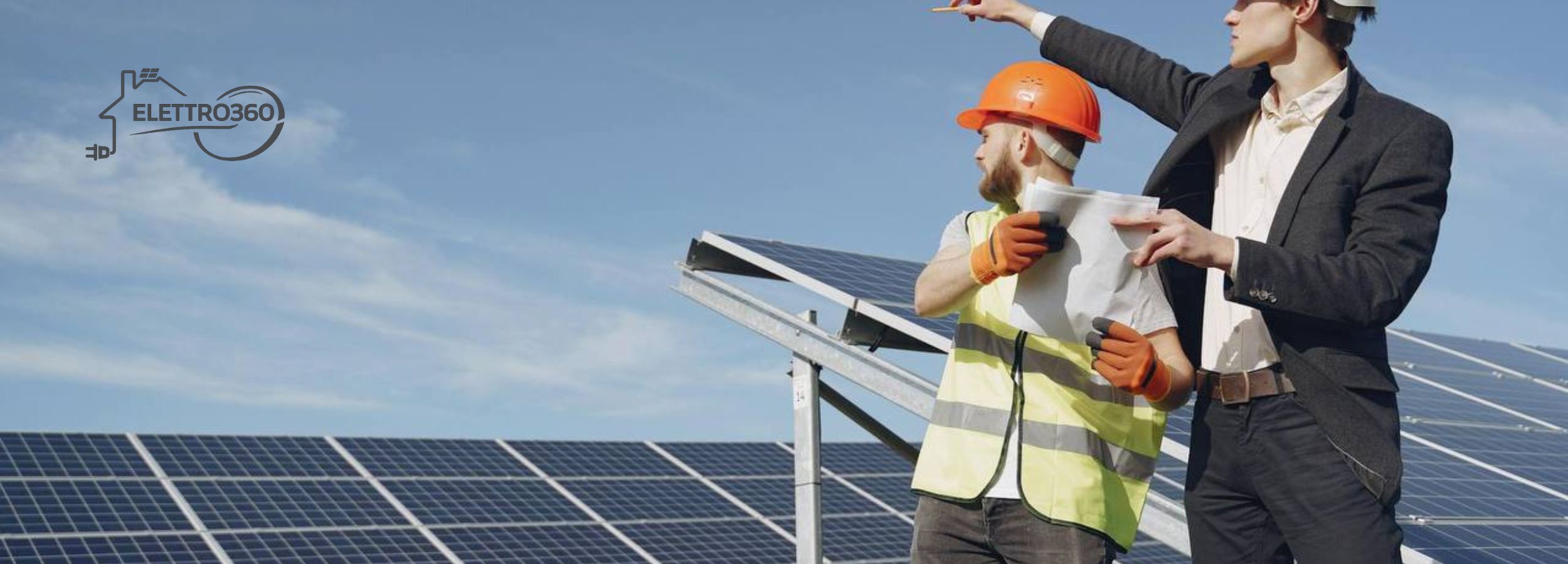 Tecnici durante la progettazione di un impianto fotovoltaico in Toscana su struttura solare